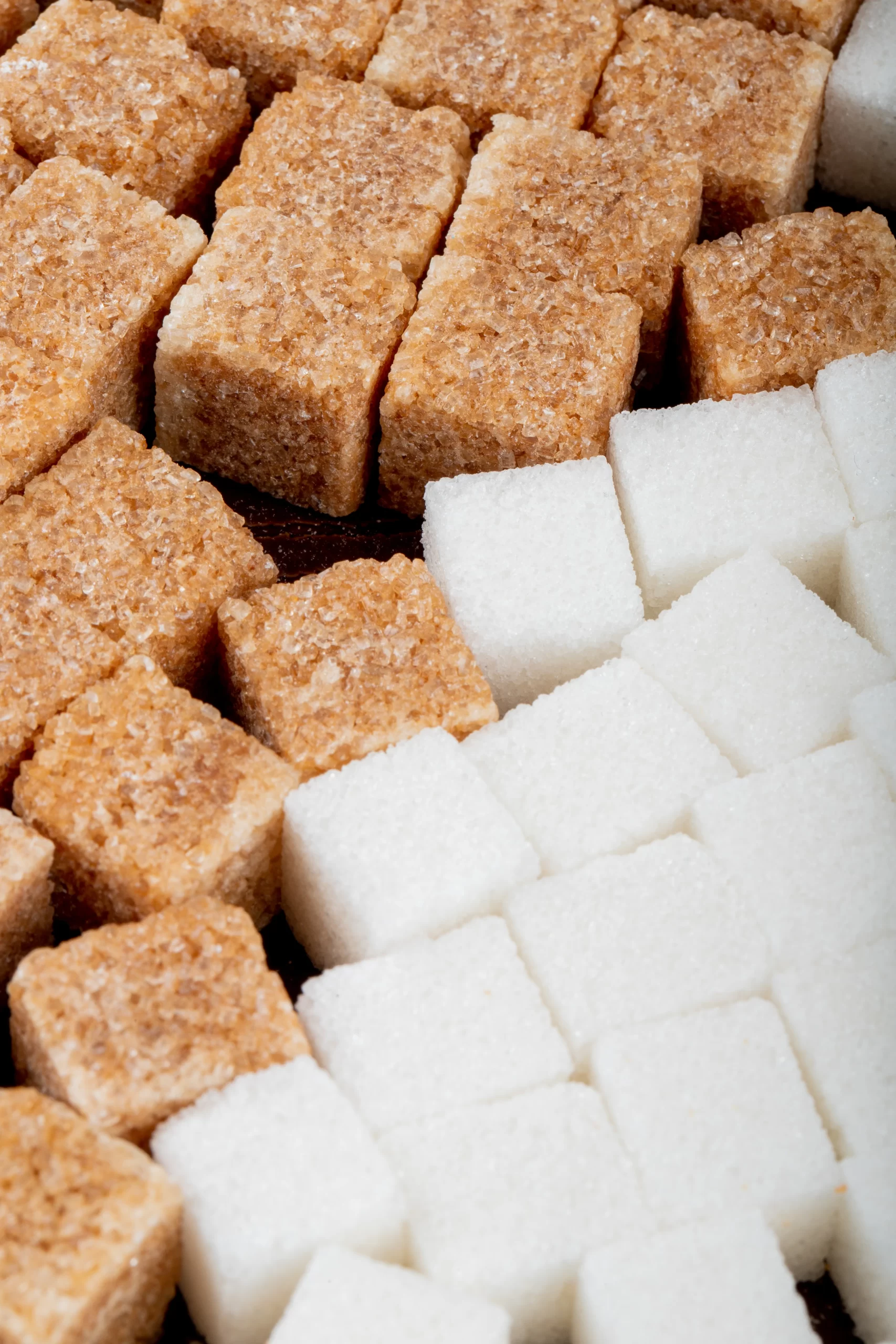 background brown white sugar cubes side view